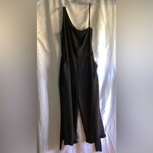 Black one shoulder jumpsuit.